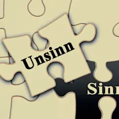 Puzzleteile mit "Unsinn" und "Sinn". Suche nach Gerson Therapie Erfahrungen, um den Sinn zu finden.