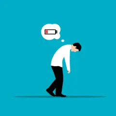 Mann mit leerer Batterie im Kopf, der die tumorbedingte Fatigue symbolisiert.
